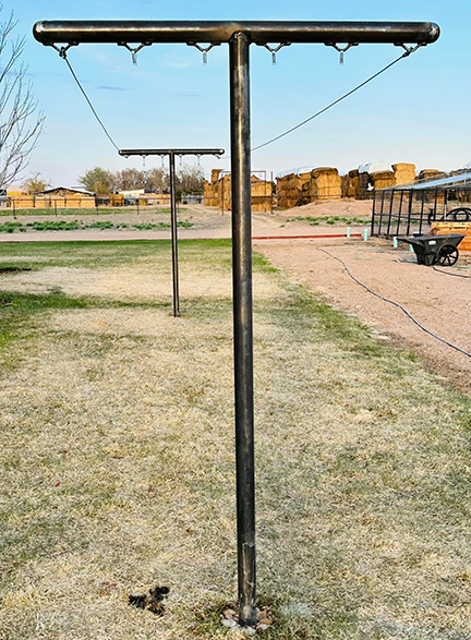 Clothes Line Constructed from 2 3/8" Drill Stem Pipe. Shown as 6 Line but can be Customized. Construction by Integrity Welding Service LLC, servicing the Front Range of Colorado.