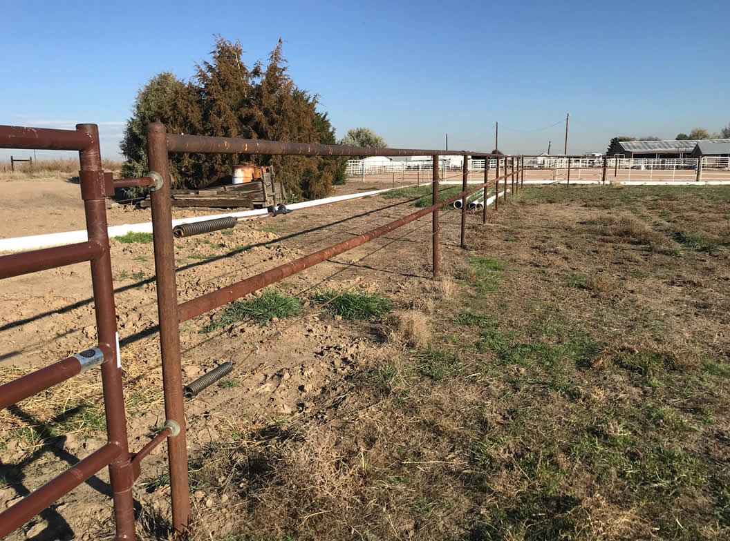 Pipe and Cable Fencing, with 3 Strands of Cable with a Rubrail it Makes some Beautiful Durable Multi Use Fence. Constructed by Integrity Welding Service LLC, servicing the Front Range of Colorado.