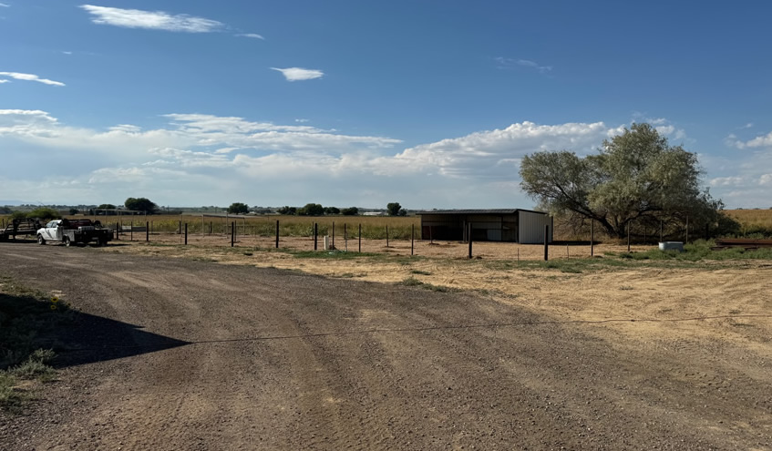 Pipe and Cable Fencing, with 3 Strands of Cable with a Rubrail. Easy to maintain around for mowing & much better than wood if you need to burn your ditch. Constructed by Integrity Welding Service LLC, servicing the Front Range of Colorado.