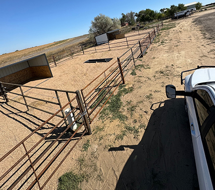 Pipe and Cable Fencing, with 3 Strands of Cable with a Rubrail. For horse pens and cattle corrals with Custom Cutouts for Drinking Posts Waterers. Constructed by Integrity Welding Service LLC, servicing the Front Range of Colorado.