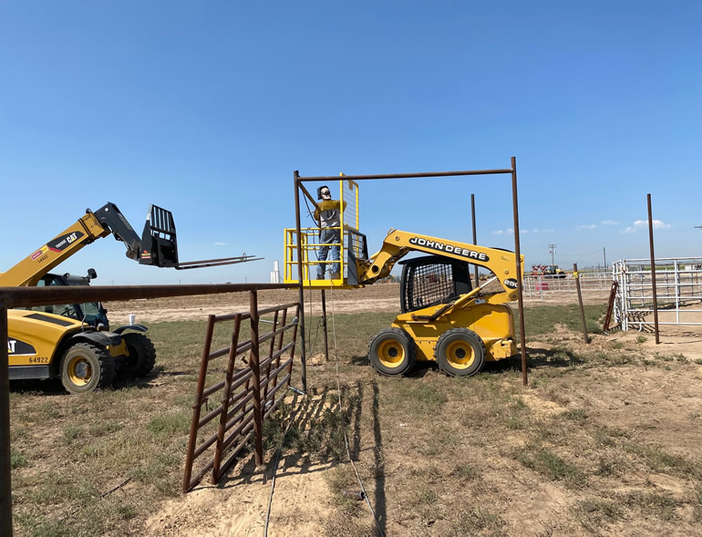Continous Fence, Cattle Working Box Construction. Gates in an alley from the Cow Pen to the Round Pen and Arena by Integrity Welding Service LLC, servicing the Front Range of Colorado.